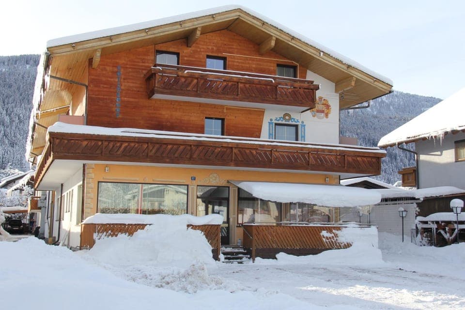 Property building, Facade/entrance, Day, Natural landscape, Winter, Mountain view