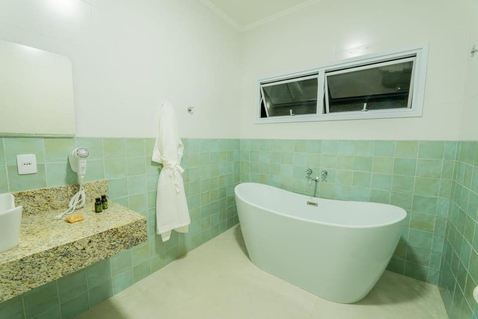 Bath, hair dryier, wardrobe