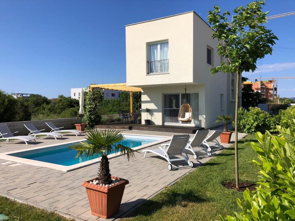 Property building, Patio, Swimming pool