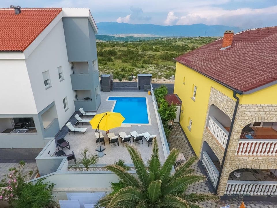 Property building, Patio, Natural landscape, Swimming pool