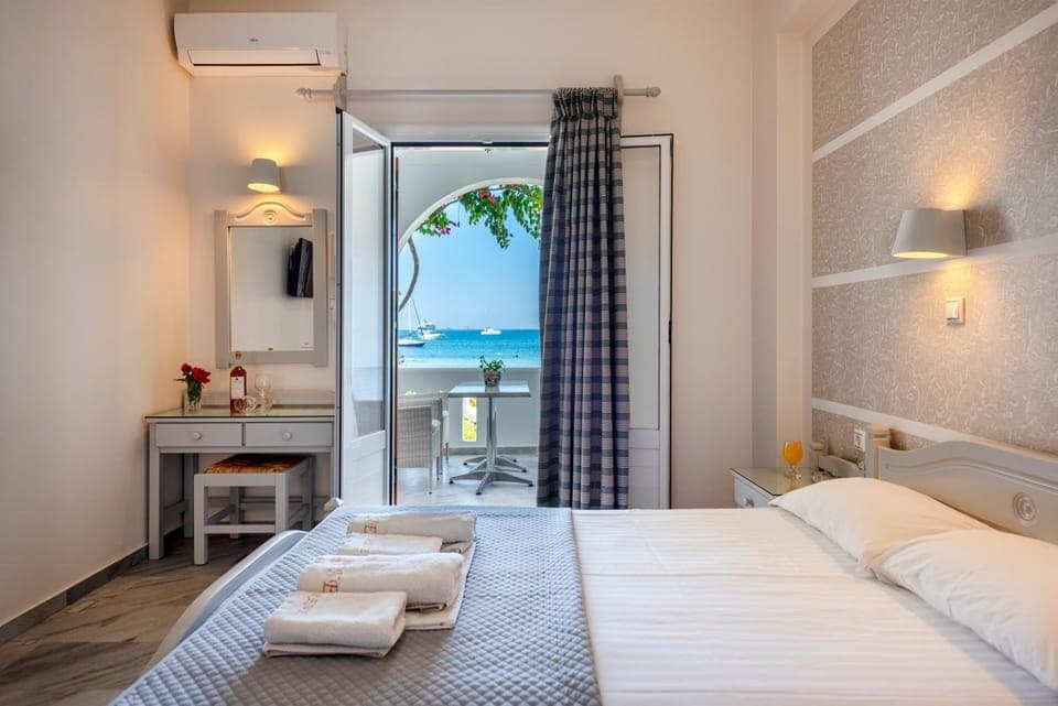 Bed, Natural landscape, Beach, Bedroom, Sea view, towels, air conditioner