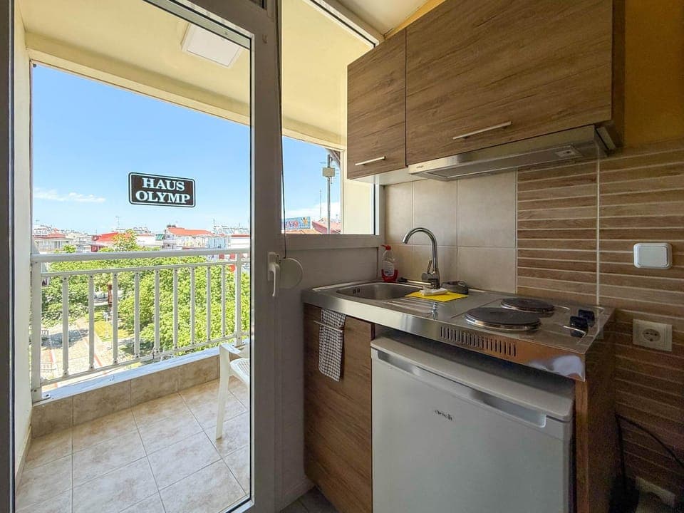 Kitchen or kitchenette, stove