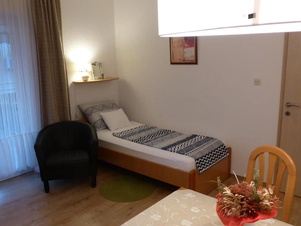 Bed, Living room, Dining area