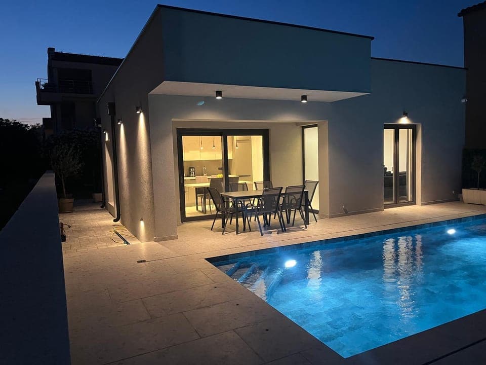 Property building, Patio, Night, Dining area, Pool view