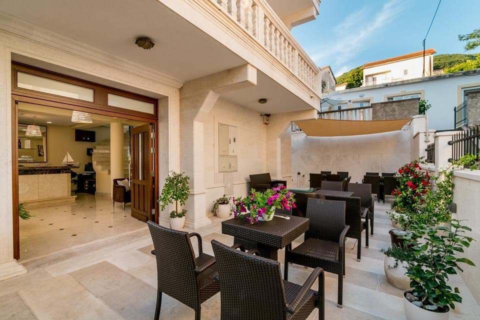 Property building, Patio, Facade/entrance, View (from property/room), Lobby or reception, Food and drinks, Decorative detail, Area and facilities