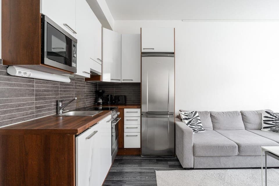 Living room, dishwasher, microwave, oven, stove, kitchen