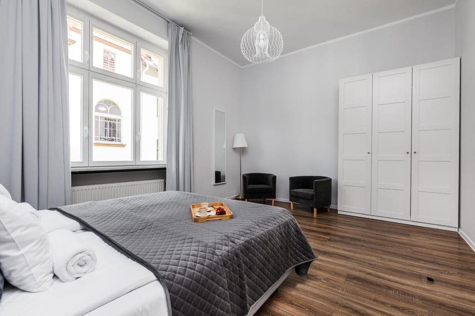 Bed, View (from property/room), Bedroom, City view, microwave, towels, wardrobe