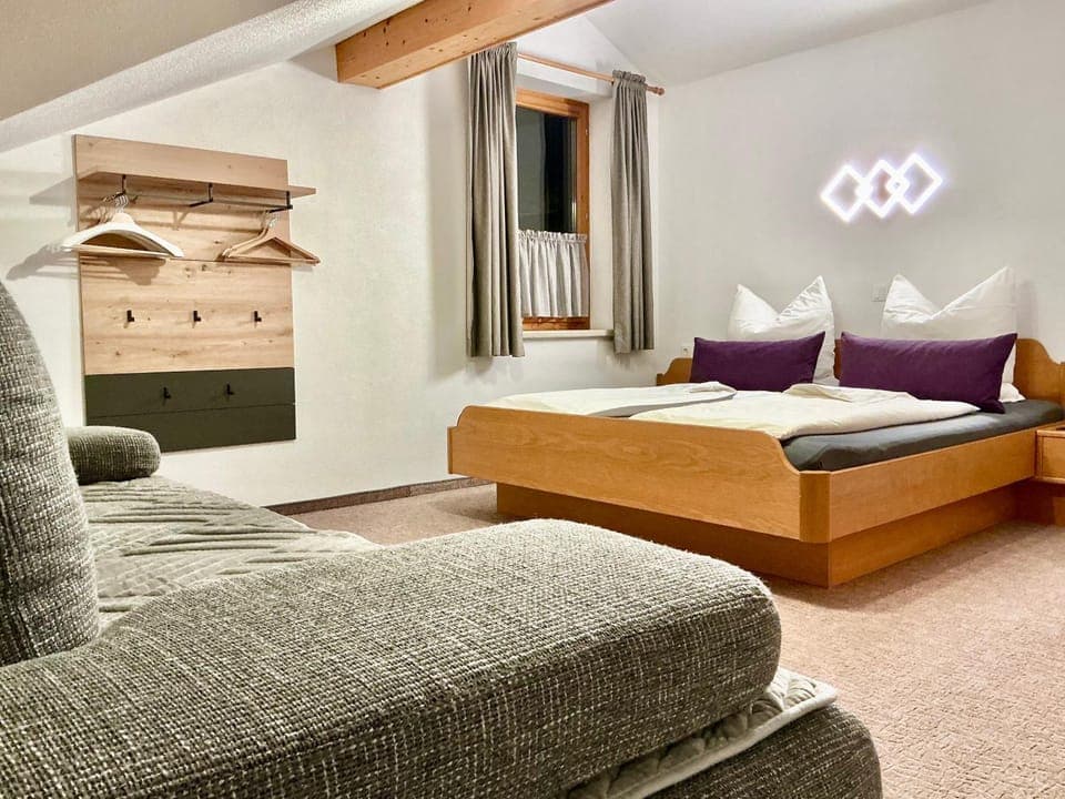 Bed, Seating area, Bedroom