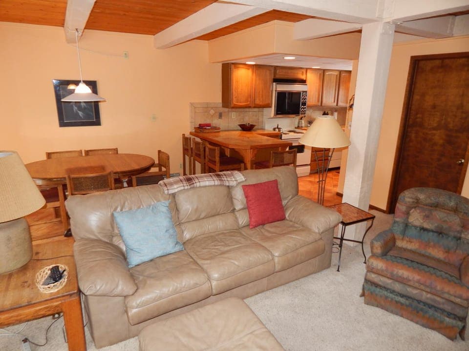 Kitchen or kitchenette, Living room, Seating area, Dining area, furniture, microwave, kitchen