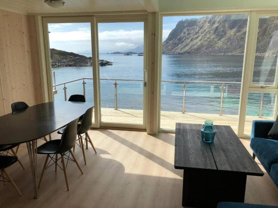 View (from property/room), Balcony/Terrace, Living room, Seating area, Dining area, Mountain view, Sea view