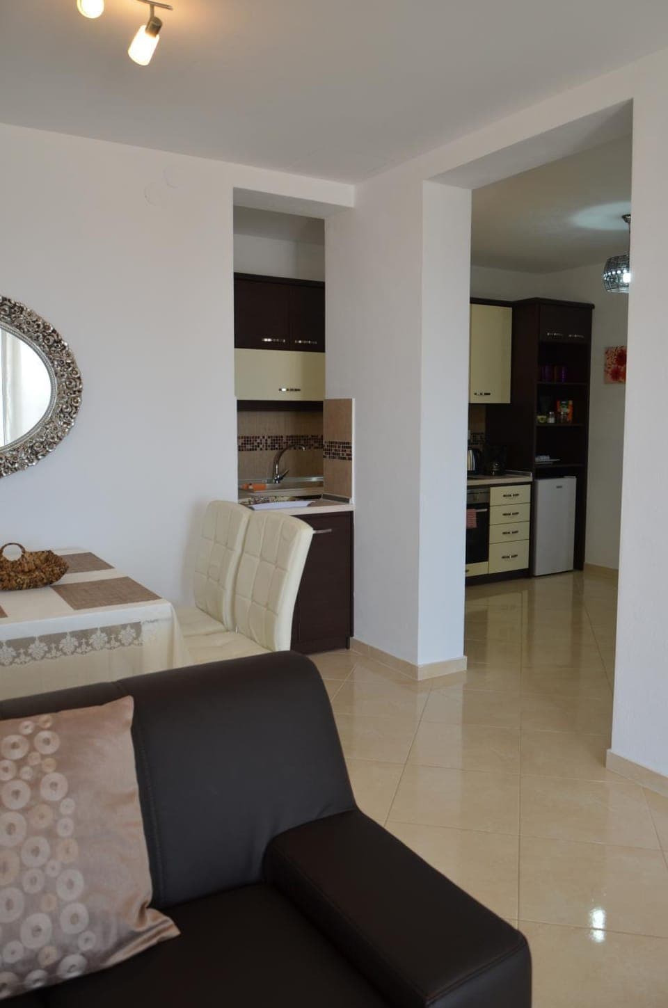 Coffee/tea facilities, Kitchen or kitchenette, Living room, Seating area, Dining area, Sea view