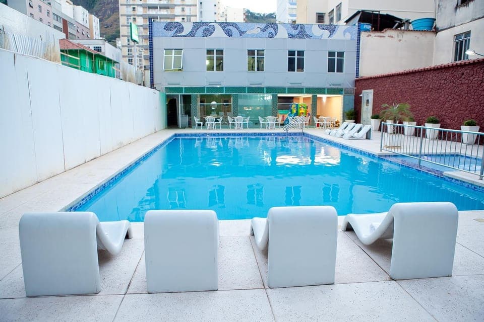 Property building, Day, Pool view, Swimming pool, sunbed