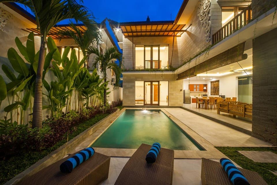 Property building, Patio, Night, Pool view, Swimming pool, sunbed