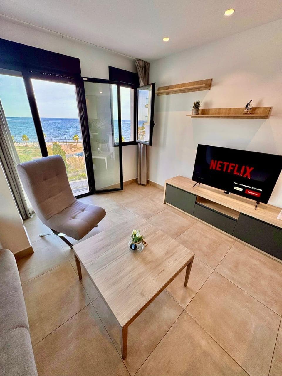 Natural landscape, Living room, Seating area, Sea view