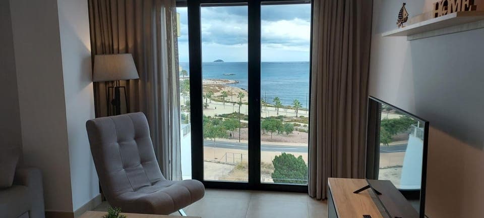 Communal lounge/ TV room, Natural landscape, TV and multimedia, View (from property/room), Living room, Seating area, Sea view