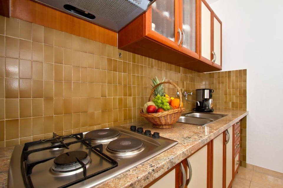 Kitchen or kitchenette, stove