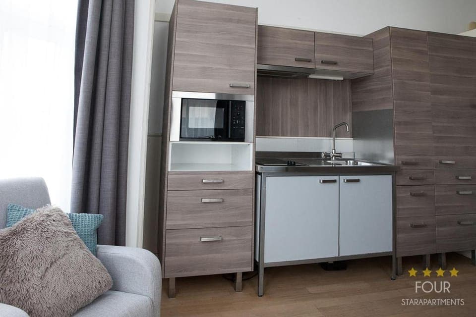 Kitchen or kitchenette, oven, stove