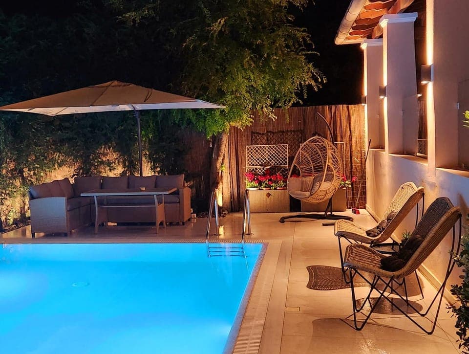 Night, Seating area, Pool view, Swimming pool