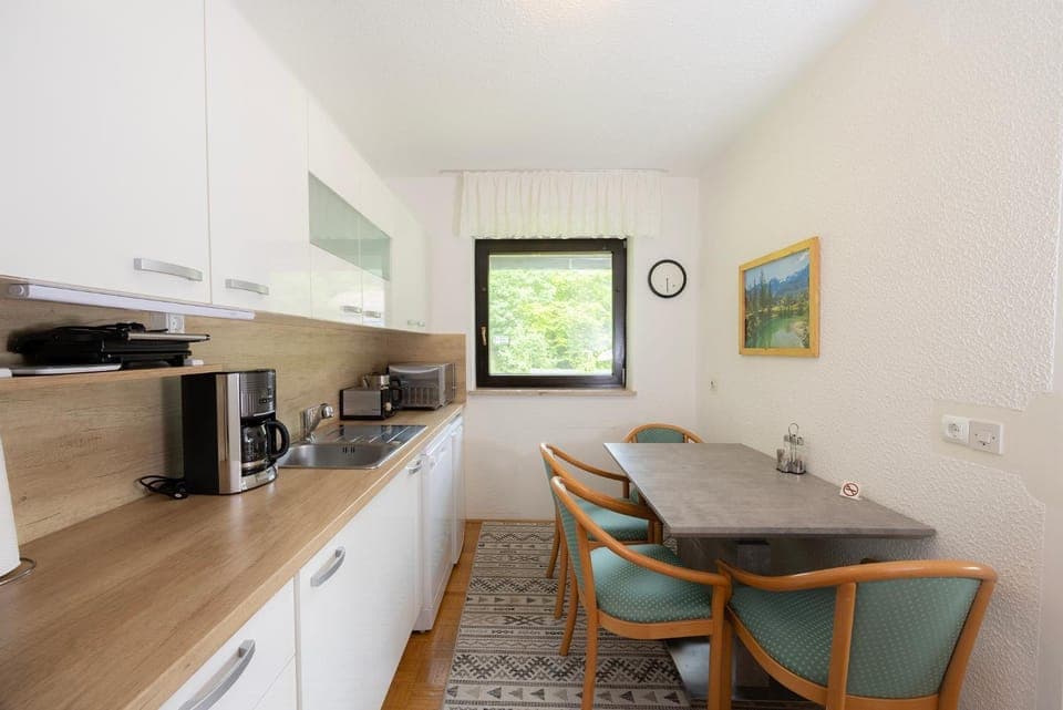 Dining area, stove, kitchen