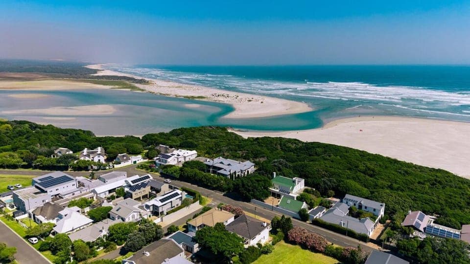 Property building, Nearby landmark, Day, Natural landscape, Bird's eye view, Beach, Sea view