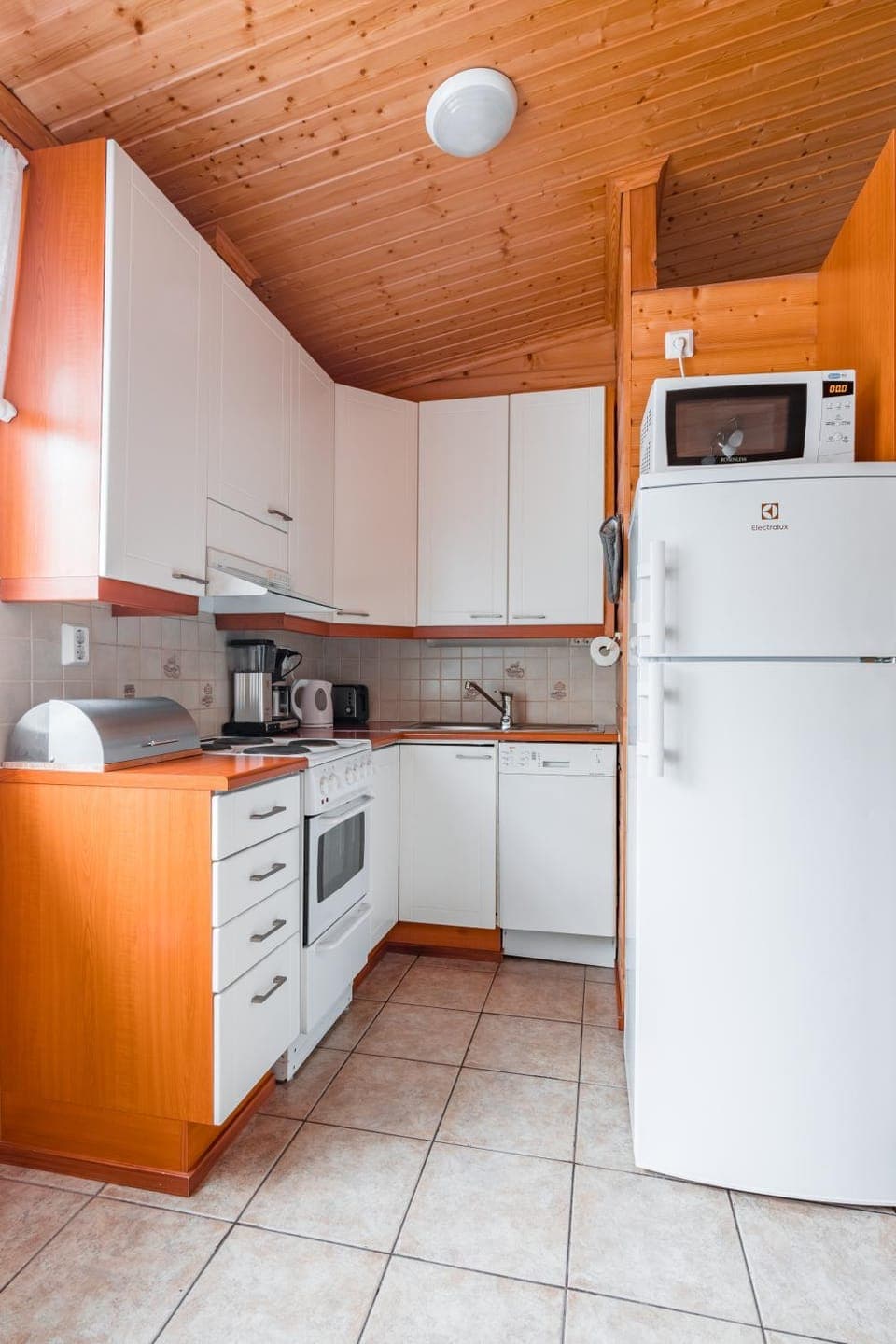 Kitchen or kitchenette, dishwasher, oven, stove, toaster