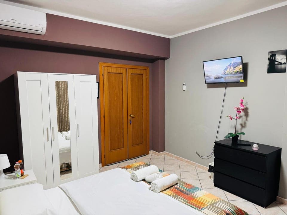 Bed, TV and multimedia, towels, wardrobe, air conditioner