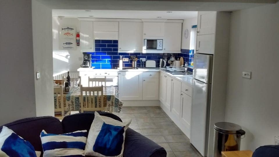 Dining area, dishwasher, oven, stove