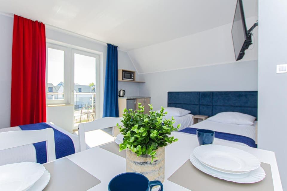 Communal lounge/ TV room, Bed, Seating area, Dining area, Bedroom