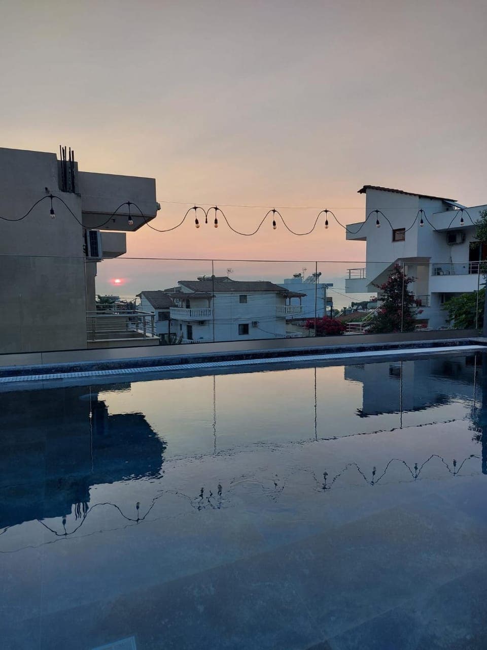 Property building, Swimming pool, Sunrise, Sunset