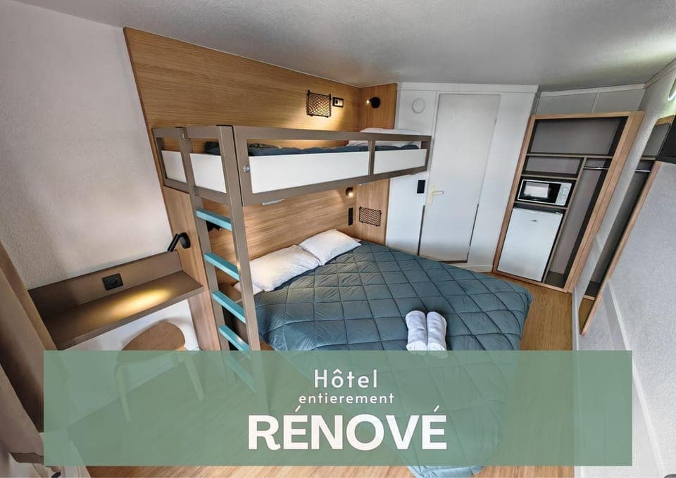 Bed, Photo of the whole room, Bedroom, bunk bed, microwave, wardrobe