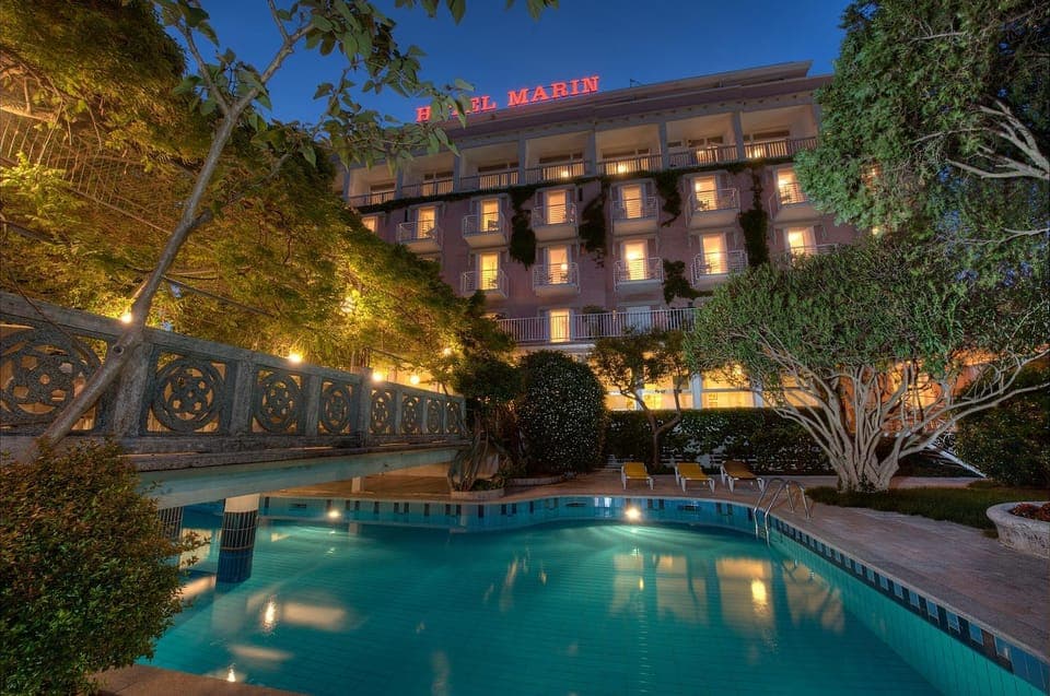 Night, Property logo or sign, Swimming pool