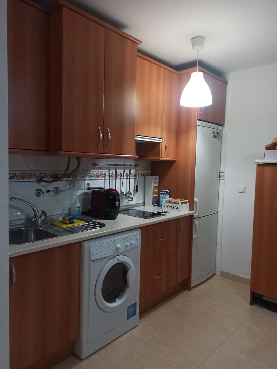 Kitchen or kitchenette, minibar, stove, washing machine, dryer