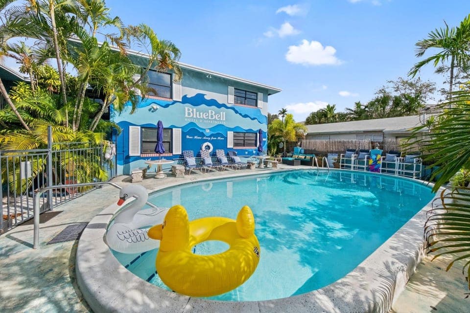 Property building, Pool view, Swimming pool, sunbed