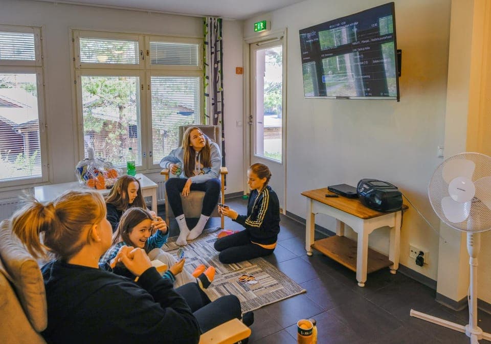 Communal lounge/ TV room, People, Seating area, Area and facilities