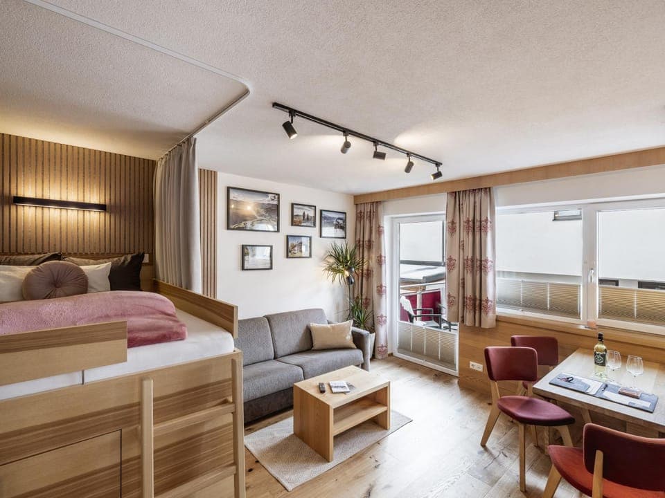 Bed, Living room, Seating area, Dining area