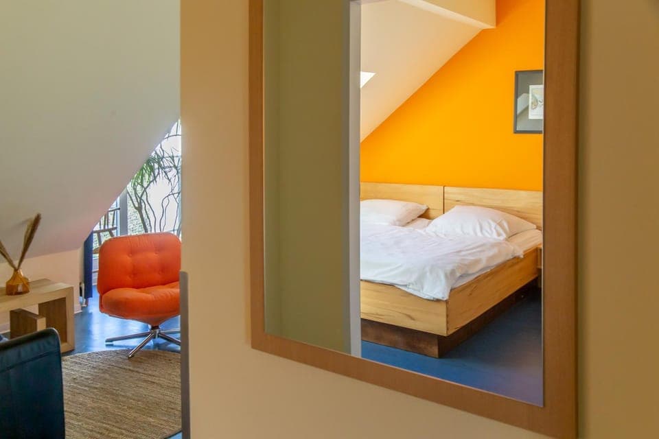 Bed, Seating area, Bedroom