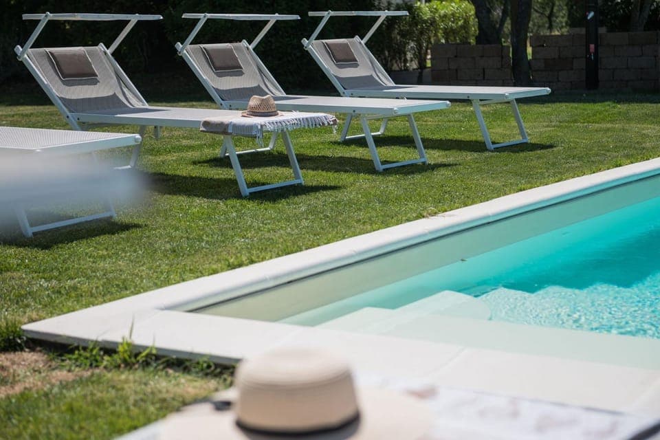 Swimming pool, sunbed