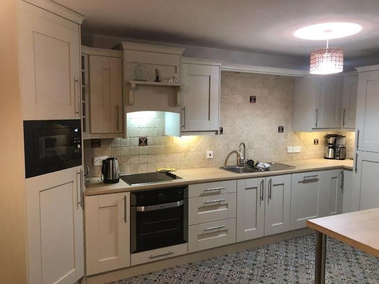 Kitchen or kitchenette, dishwasher, oven, stove, toaster