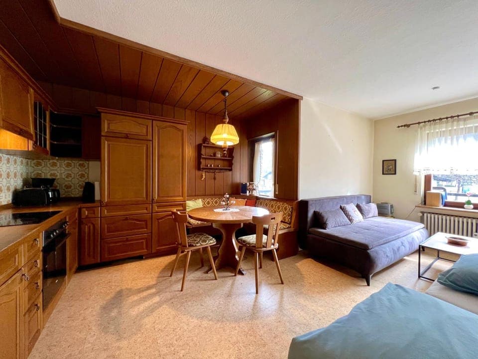 Kitchen or kitchenette, Living room, Seating area, Dining area