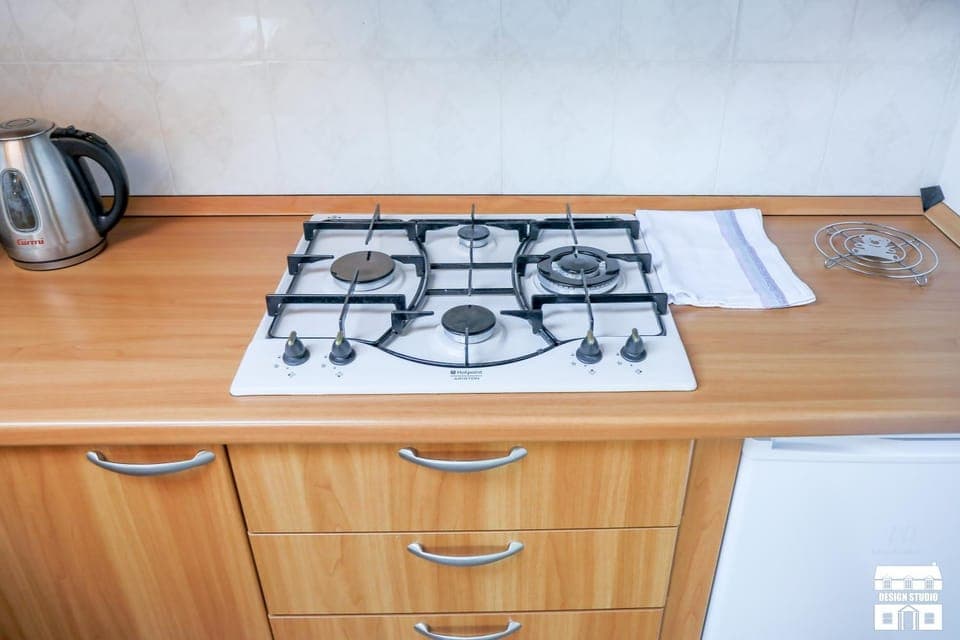 Kitchen or kitchenette, stove