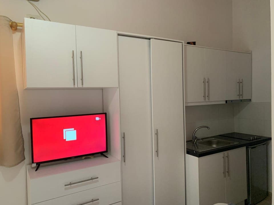 Kitchen or kitchenette, stove, wardrobe