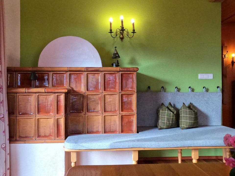 Photo of the whole room, Seating area, heating, oven, stove