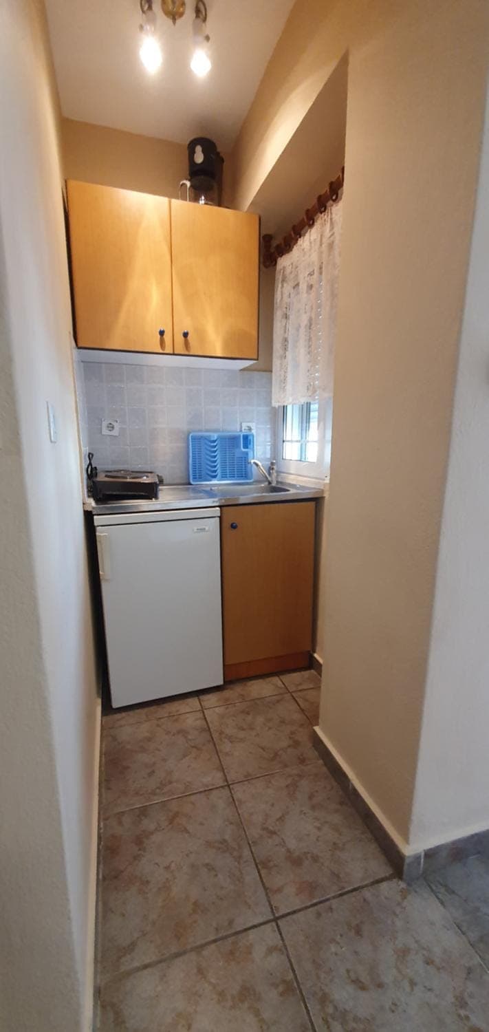 Kitchen or kitchenette, stove