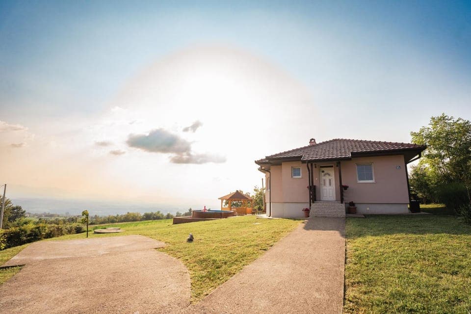 Property building, Day, Natural landscape, View (from property/room), Swimming pool