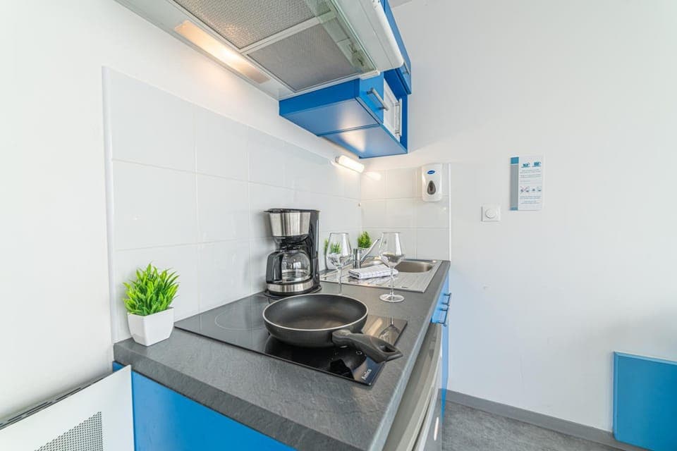 Kitchen or kitchenette, stove