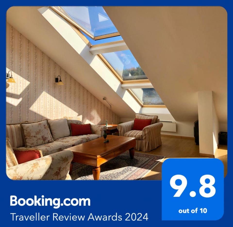 Living room, Seating area, Text overlay, Certificate/Award, furniture, furniture