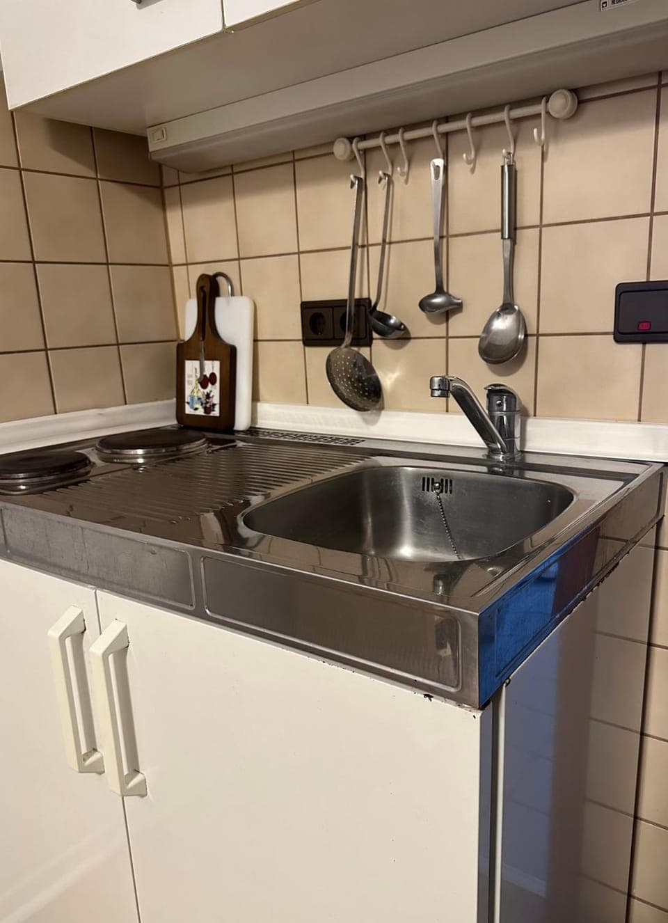 Kitchen or kitchenette, stove