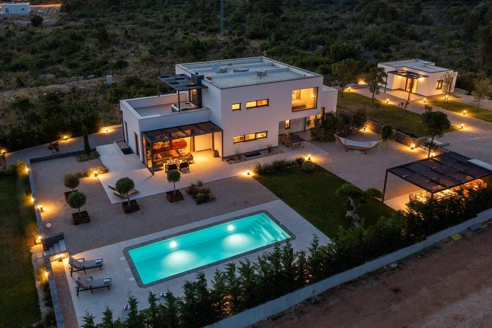 Property building, Patio, Night, Natural landscape, Garden, Pool view, Swimming pool, sunbed