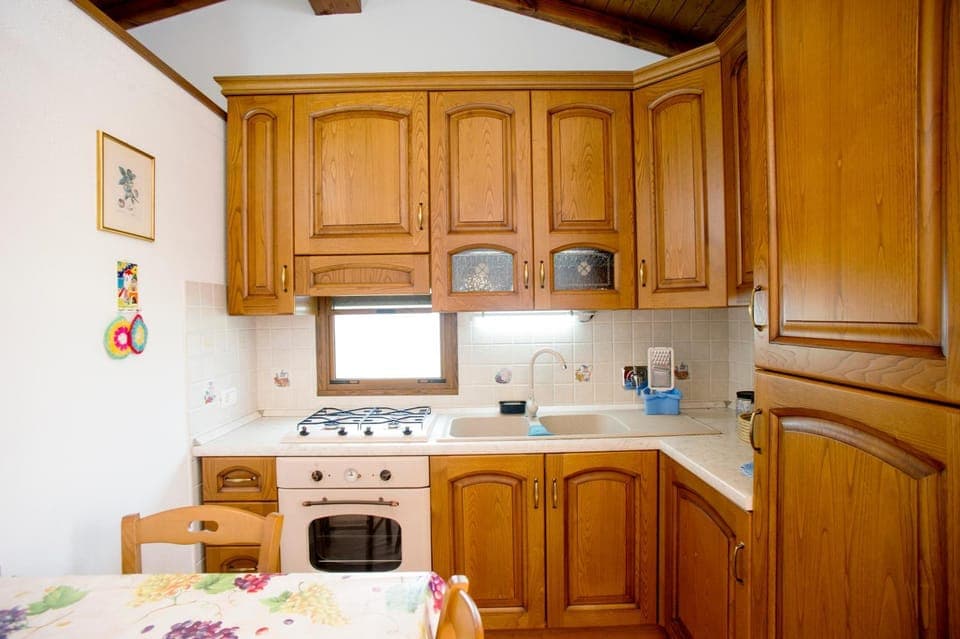 Kitchen or kitchenette, oven, stove
