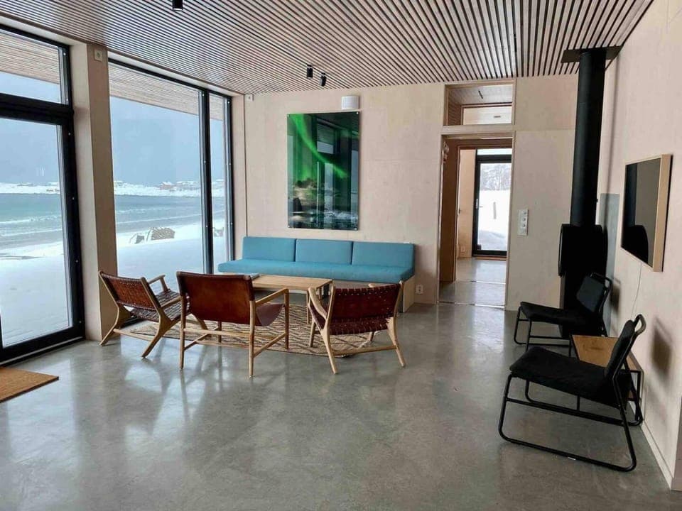 TV and multimedia, View (from property/room), Living room, Seating area, Beach, Sea view